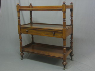 A Victorian mahogany 3 tier buffet, the base fitted 1 long drawer raised on turned supports 36"
