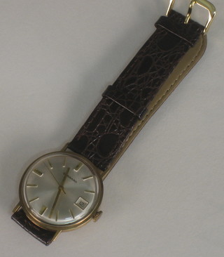 A gentleman's wristwatch by Garrard contained in a gold case