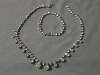 A diamonte necklace together with a matching bracelet