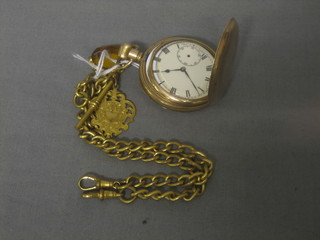 A gold plated pocket watch contained in a full hunter case together with a gold plated curb link double Albert watch chain