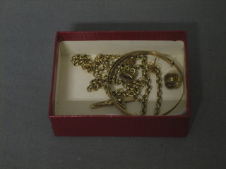 A gilt metal crucifix, a gilt metal chain, 2 pairs of earrings and a gilt metal bracelet