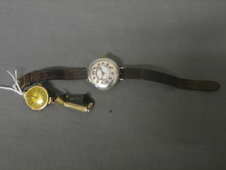 A lady's gold cased wristwatch and a gentlemans silver cased wristwatch contained in a demi-hunter case