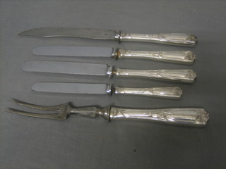 A Continental silver handled 2 piece carving set, 2 table knives and a tea knife