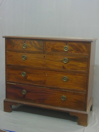 A 19th Century mahogany chest of 2 short and 3 long graduated drawers with brass ring neck drop handles, raised on bracket feet 39" (some damage to veneers)