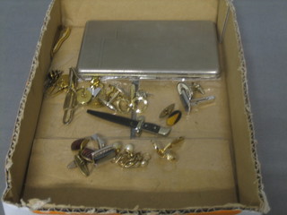 A chromium plated cigarette case and a collection of costume jewellery