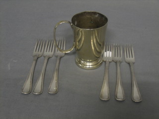 A silver plated tankard and 6 silver plated spoons with bean decoration