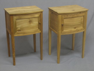 A pair of Victorian style bleached mahogany bow front bedside cabinets 18"