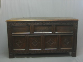 A Victorian carved oak coffer constructed from old timber marked DB1083 55"