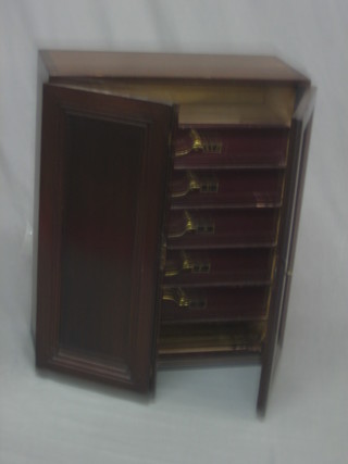 A 19th Century mahogany filing cabinet, the interior fitted 5 filing drawers enclosed by panelled doors 19"