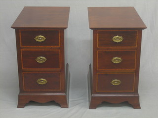 A pair of Edwardian inlaid mahogany pedestal chests fitted 3 long drawers raised on bracket feet 15"