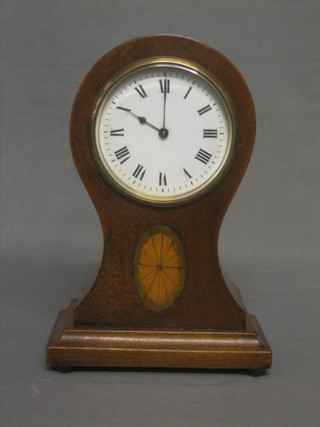 An Edwardian 8 day bedroom timepiece with enamelled dial and Arabic numerals contained in an inlaid mahogany balloon shaped case