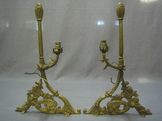 A pair of gilt Ormolu wall light brackets