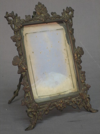 A 19th Century gilt metal easel frame cast leaf decoration 9"