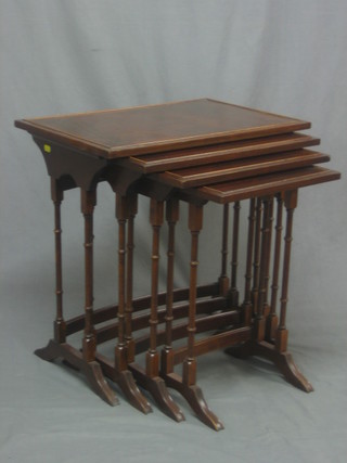 A quartetto of Georgian style mahogany coffee tables, raised on turned and block supports 23"