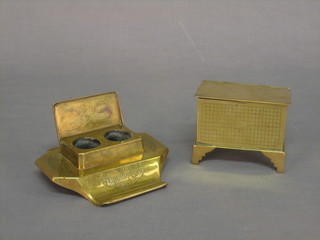 An Art Nouveau rectangular brass twin bottle inkwell with hinged lid and 2 pen rests 5" together with a brass trinket box in the form of a coffer 4"