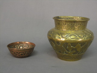 A hammered brass jardiniere 7" and a circular copper bowl decorated a bird 5"