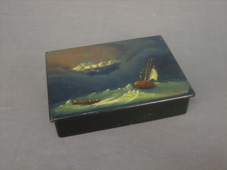 A rectangular black lacquered Russian trinket box with hinged lid decorated a ship in heavy sea 8"