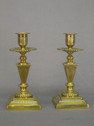 A pair of Victorian brass candlesticks 8"