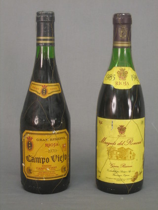 A bottle of 1970 Rioja Campo Viejo together with a bottle of 1985 Marques De Romeral