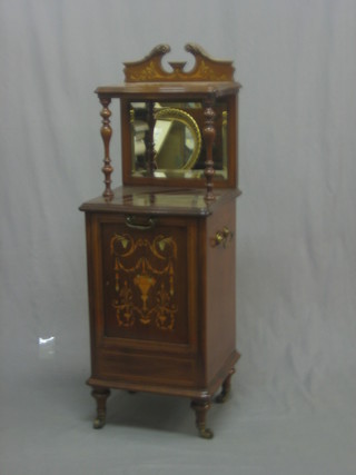 An Edwardian inlaid mahogany coal purdonium with raised back above a mirrored panel, the fall front inlaid an urn 14"