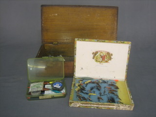 A rectangular 19th Century mahogany box with hinged lid containing a cigar box with collection of flies and other fishing tackle etc 15"