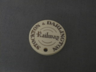 A 19th Century circular carved ivory Director's ticket for the Stockton & Darlington railway marked Director's ticket No.7