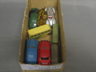 A pressed metal model of a racing car, a clock work model of a bus, do. tank and 5 other model cars etc