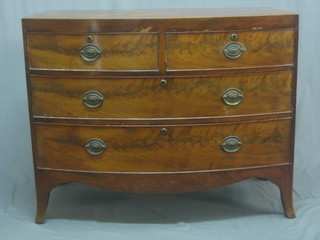 A Georgian mahogany bow front chest of 2 short and 2 long drawers raised on splayed bracket feet 40"