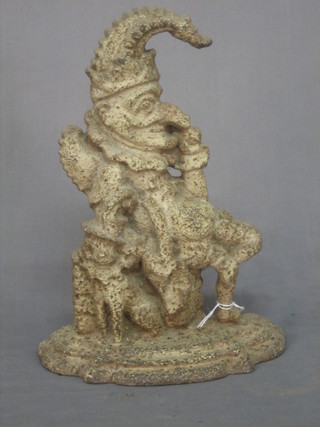 A Victorian cast iron door stop in the form of Mr Punch 12"