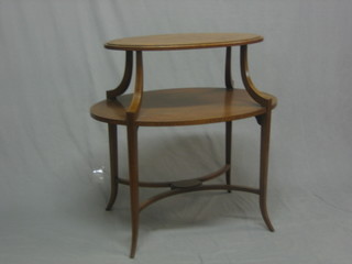 An Edwardian oval inlaid mahogany 2 tier etagere, raised on outswept supports 30"