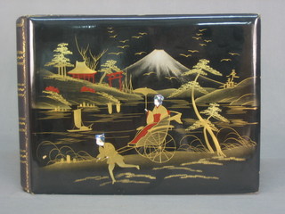 An Oriental lacquered photograph album and a set of playing cards