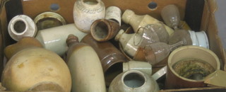 A box containing old Stoneware bottles etc
