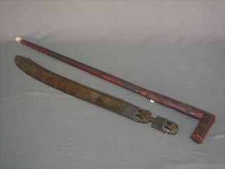 An Eastern carved wooden sword 27" and a leather covered walking stick