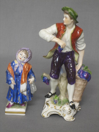 A Continental porcelain figure of a standing grape harvester 7" and 1 other of a standing waif 4"