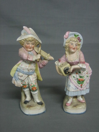 A pair of 19th Century biscuit porcelain figures in the form of children musicians 7"
