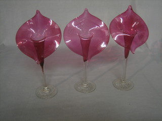 3 Victorian cranberry glass flared shaped vases with clear glass stems 13"