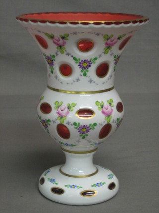 A 19th Century Bohemian red and white enamelled glass vase of trumpet form with floral decoration 8 1/2"