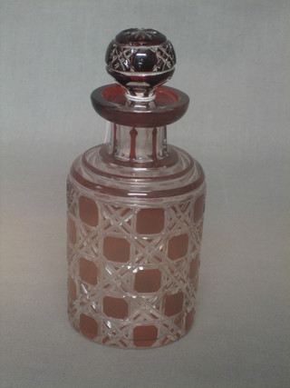 A red overlay cut glass club shaped bottle 6"