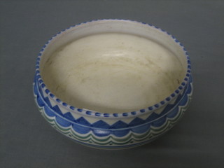 A circular Poole Pottery bowl, the base marked Carter Sadler Adams 7" (cracked)