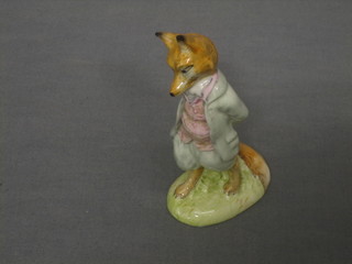 A Beswick Beatrix Potter Bunnykins figure - Foxy Whiskered Gentleman with brown base 1954