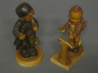 A Hummel figure of a boy conductor (hand f and r) 5" and 1 other of a boy chimney sweep 5"