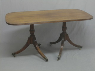 A Georgian style D end dining table raised on twin pillar supports 60"