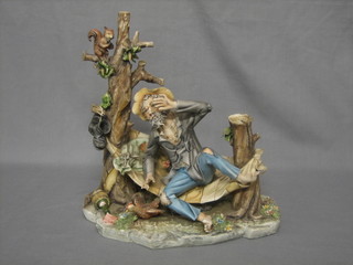 A Capo di Monte style biscuit porcelain figure of an inebriated tramp 12"