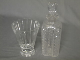A faceted cut glass vase 7" together with a shaped cut glass decanter and stopper
