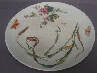 A Minton pottery green glazed charger with floral decoration, the reverse with impressed Minton mark 15"