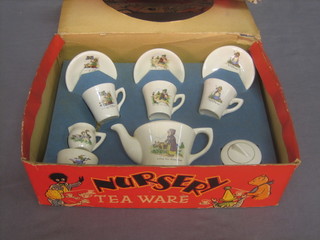 A 10 piece nursery teaware tea service comprising teapot, sugar bowl, cream jug and 3 cups and saucers boxed