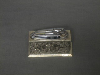A rectangular embossed Eastern silver lighter case decorated an elephant 4"