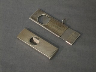 2 silver cigar cutters 