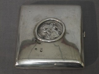 A silver plated cigarette case, the lid set a coin and a silver plated match slip 