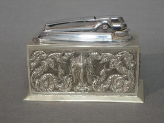 A rectangular embossed Eastern silver lighter case decorated an elephant 4"